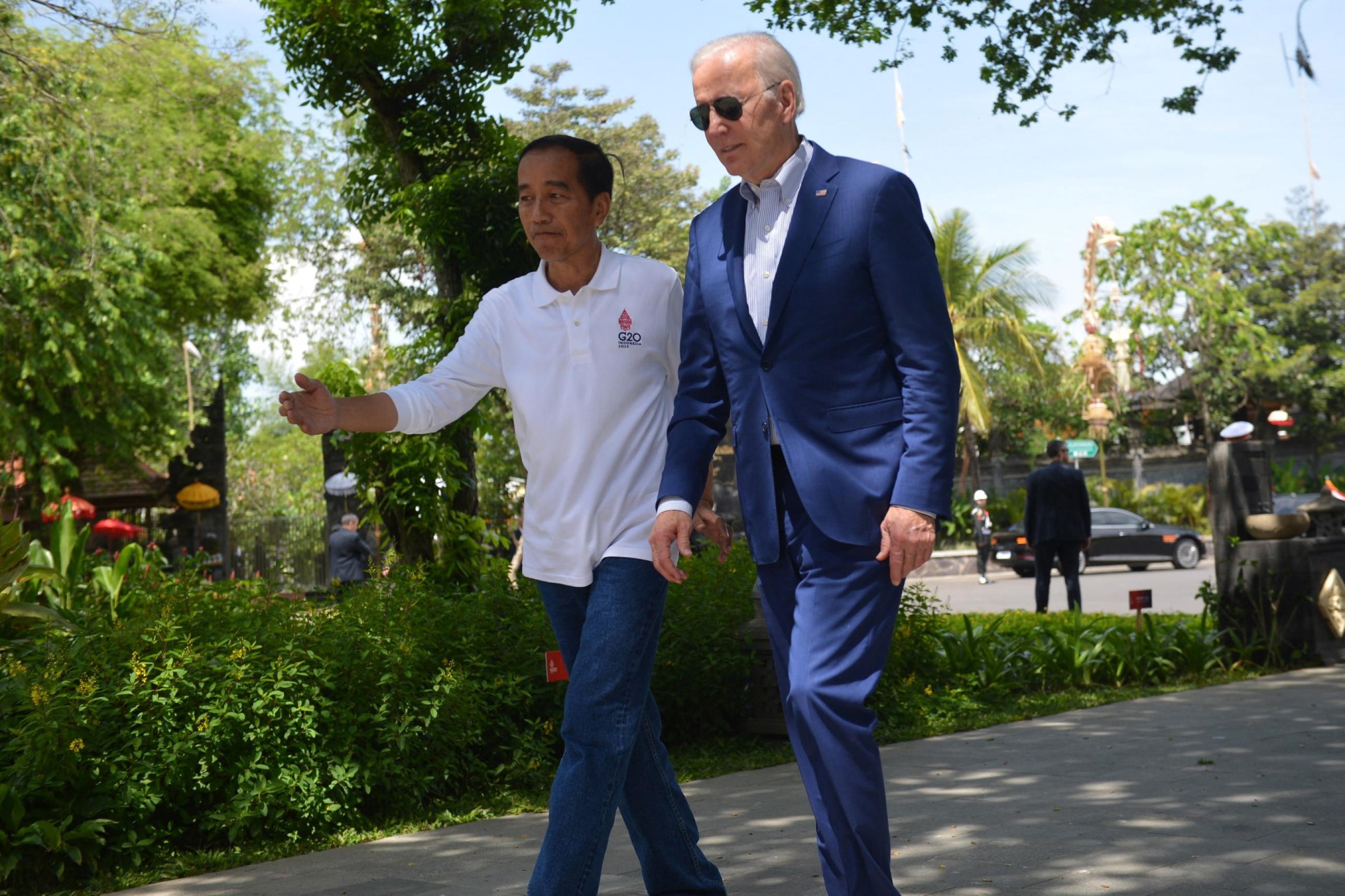 Indonesian President Joko Widodo welcomes U.S. President Joe Biden on the second day of the G20 Indonesia Summit events at the Ngurah Rai Forest Park, Denpasar, Bali, Indonesia, on November 16, 2022.