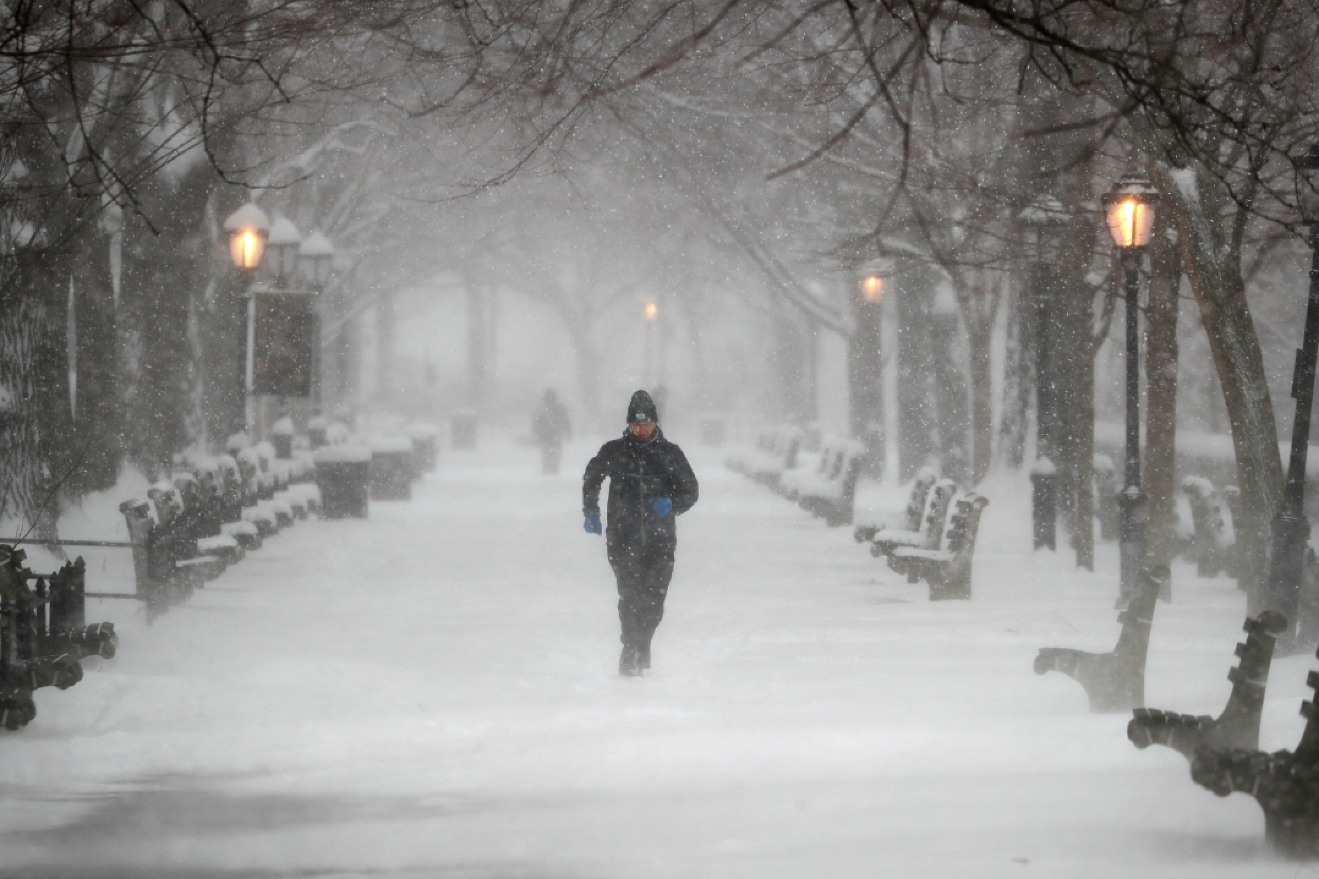 A man runs in Riverside Park during a winter storm on the upper west side of Manhattan in New York City, New York, on February 1, 2021. REUTERS/Mike Segar