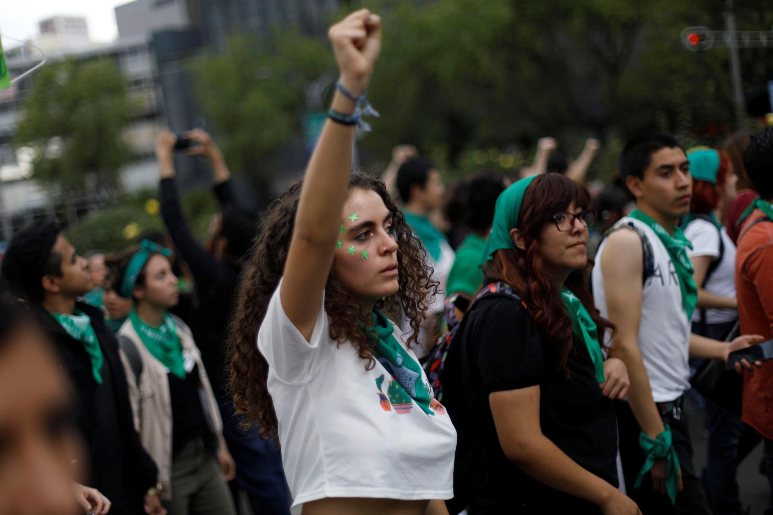 An abortion rights activist gestures during a demonstration in Mexico City. 