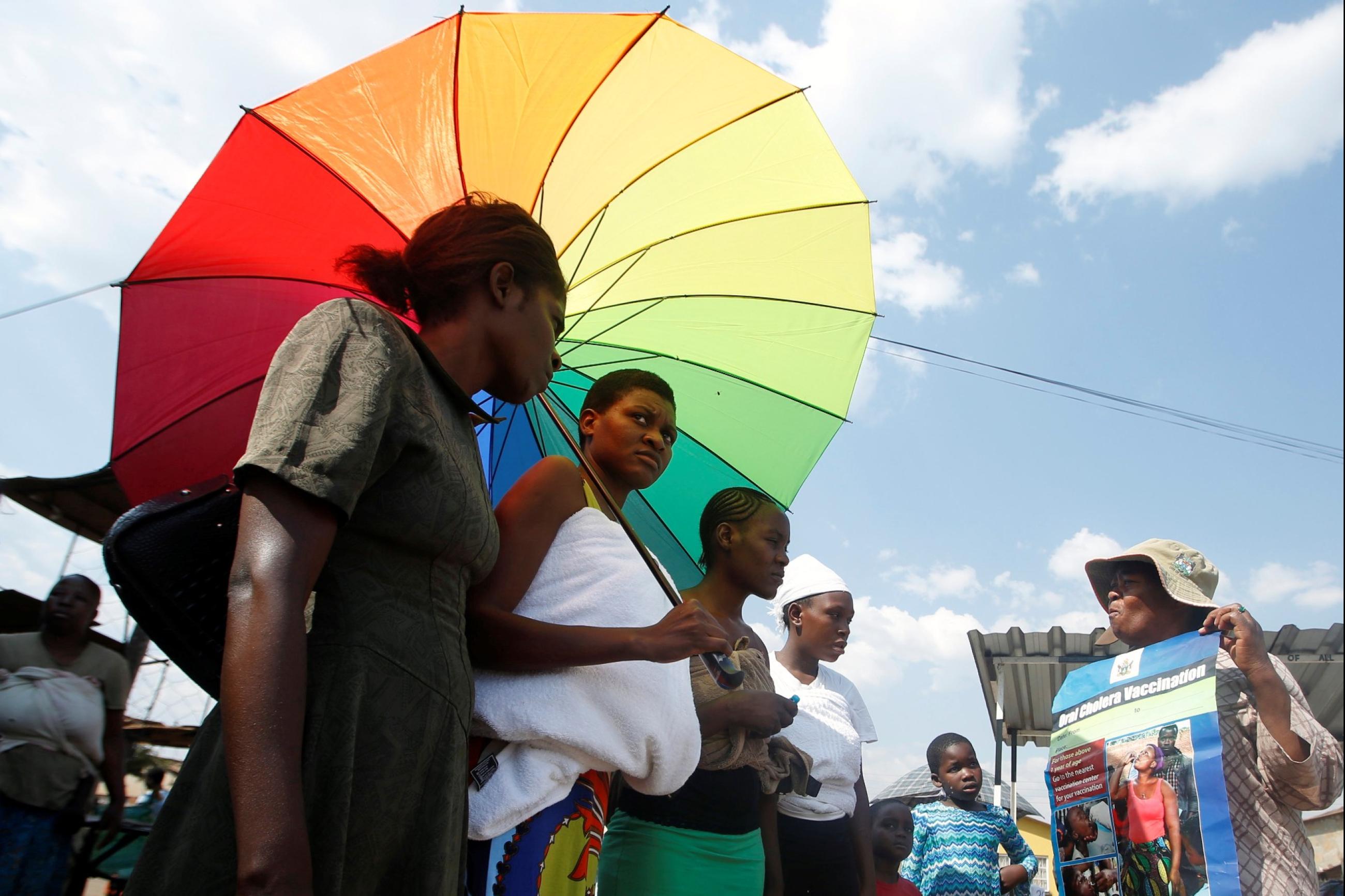 Residents queue to receive cholera vaccinations at a clinic in Harare, Zimbabwe, on October 4, 2018.