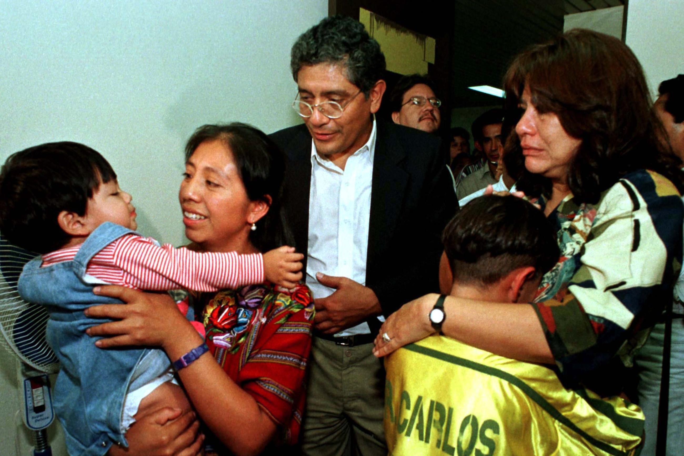 Elivia Ramirez holds her son, Pablito, after recovering him from a foster home in a landmark case, in Guatemala, on August 16, 1998. Elivia says that she was tricked into giving her son for adoption.