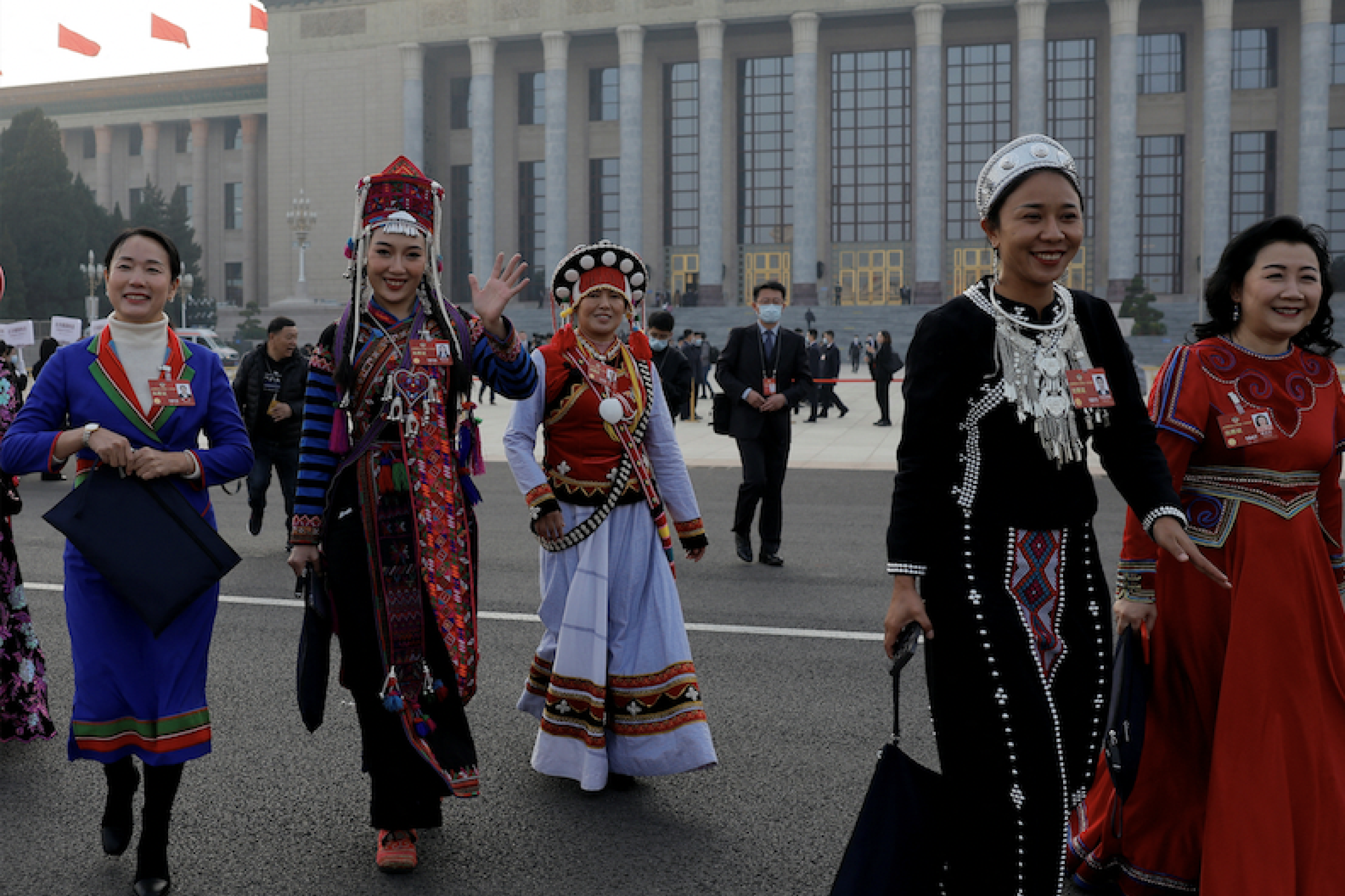 Women delegates in ethnic minority costumes leave the Great Hall of the People following the opening session of the Chinese People's Political Consultative Conference (CPPCC) in Beijing, China March 4, 2023. REUTERS/Thomas Peter