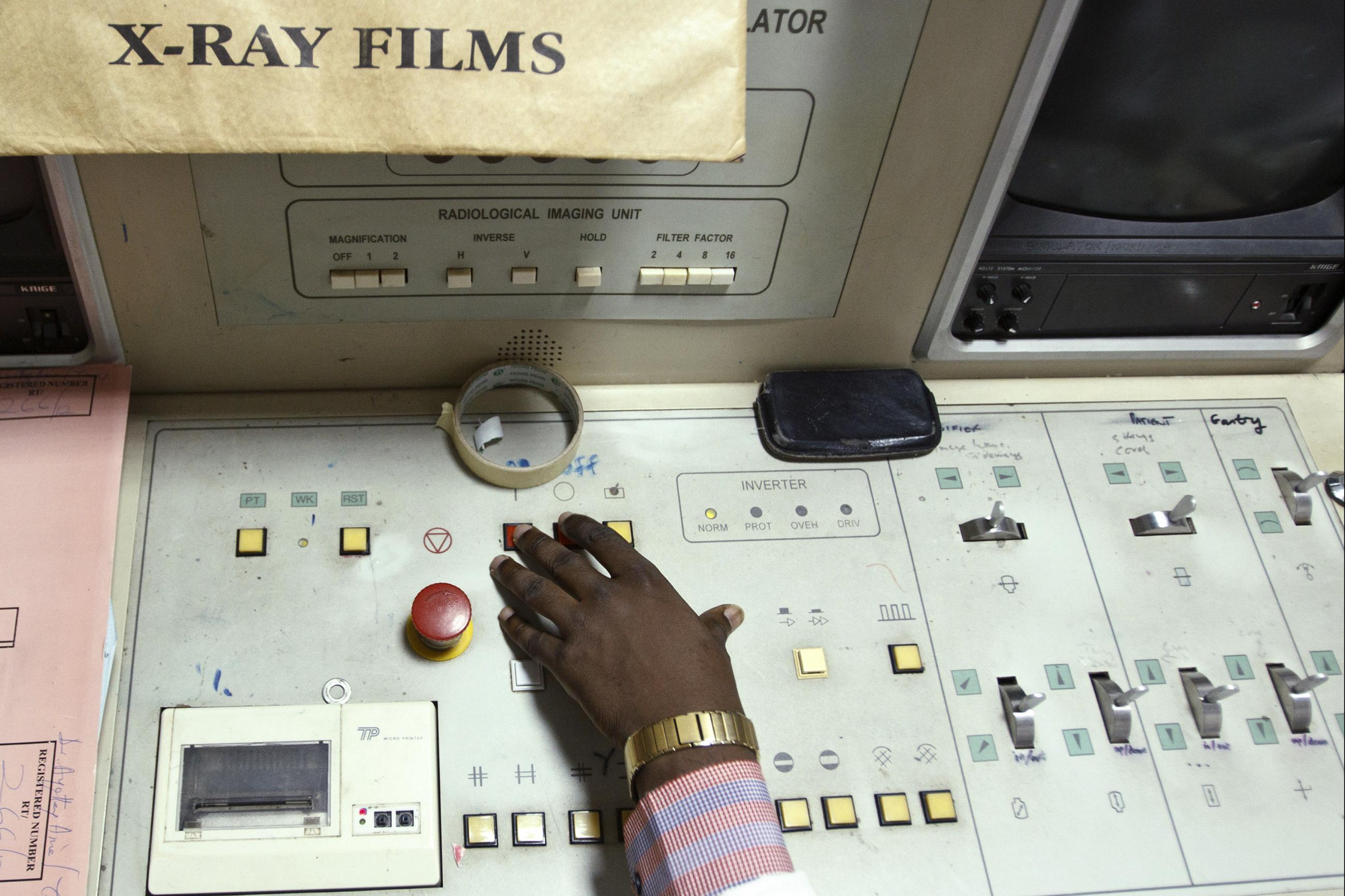 Radiotherapist Enock Okine operates a radiotherapy simulator at the Korle Bu Teaching Hospital in Accra April 24, 2012.