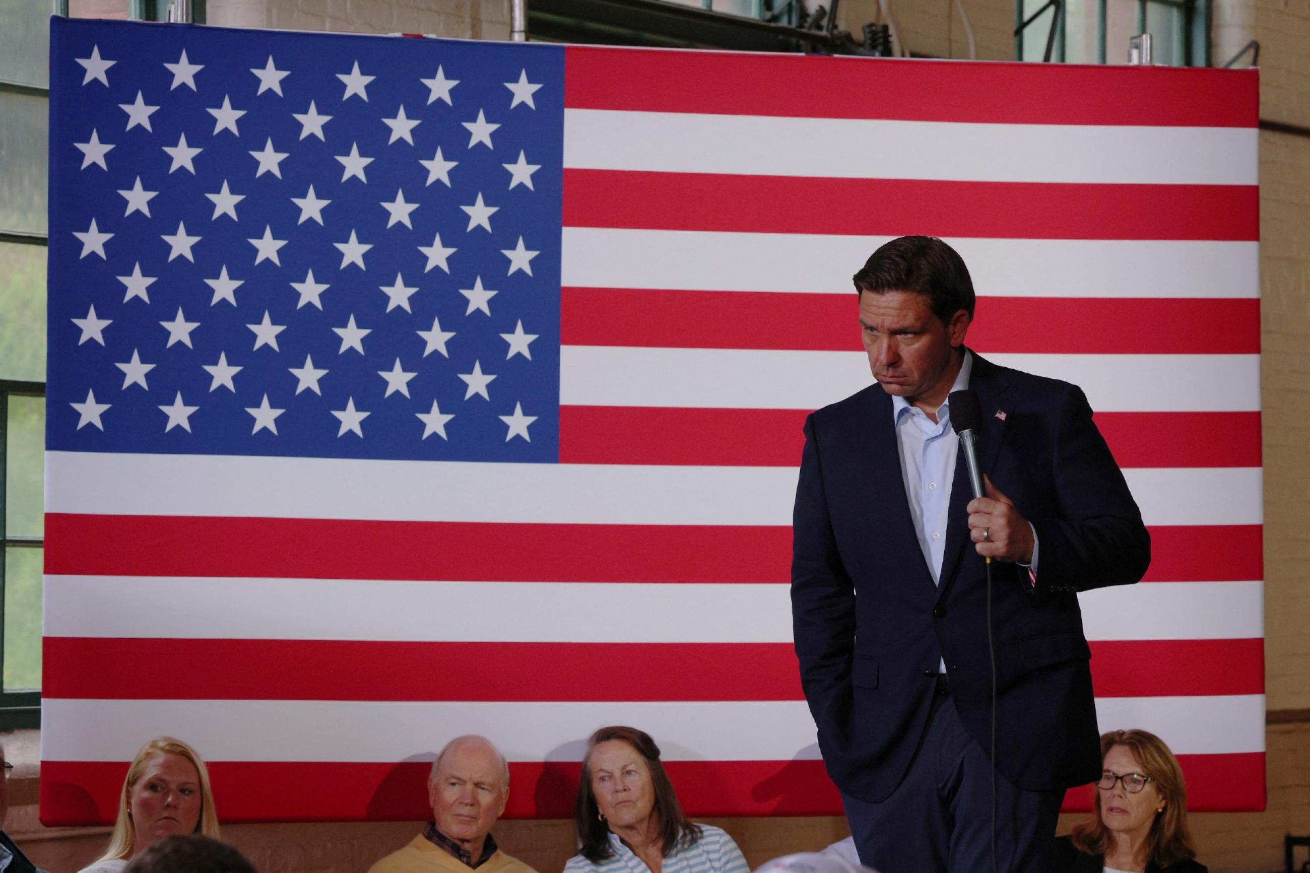 Republican presidential candidate and Florida Governor Ron DeSantis listens to a question from the audience at a campaign town hall meeting, in Newport, New Hampshire, on August 19, 2023. 