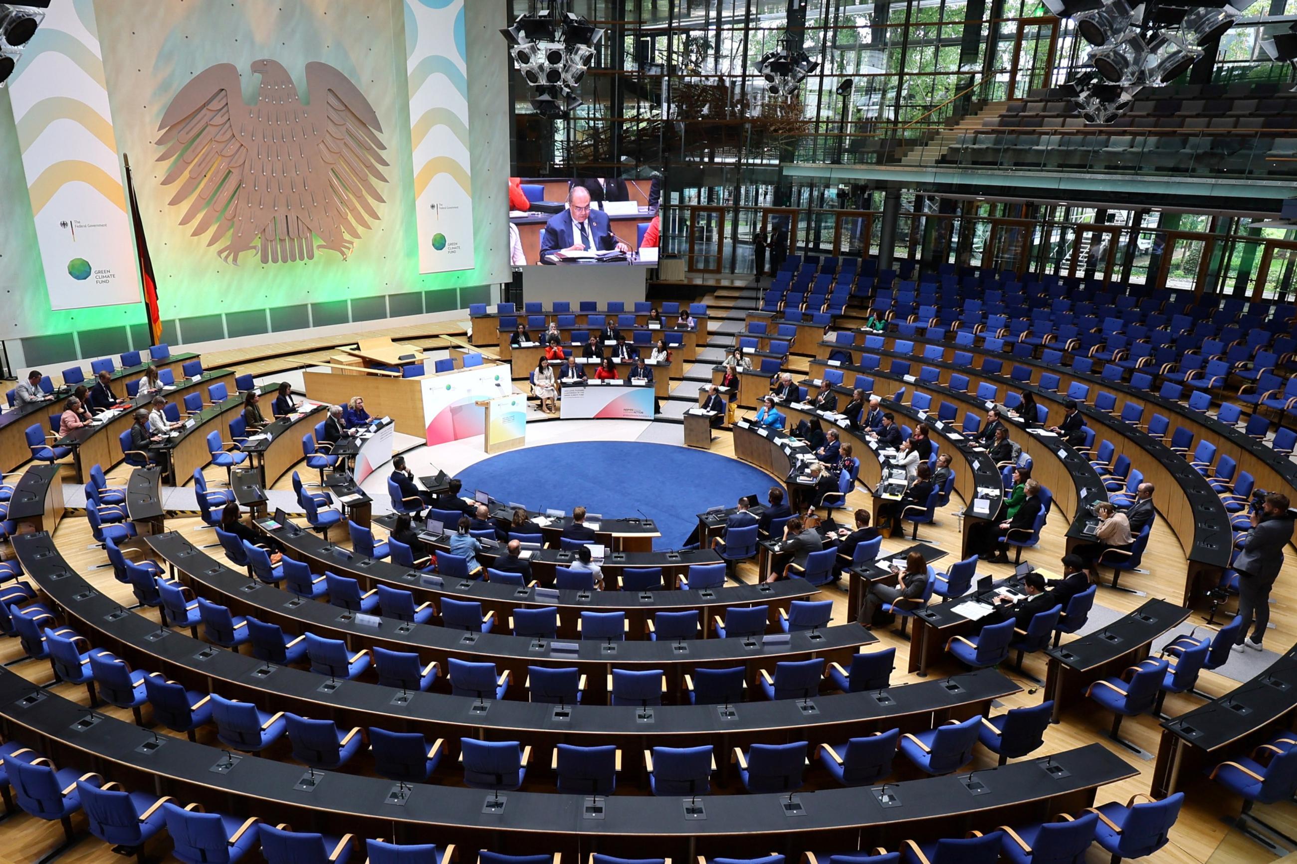 A general view shows the plenary hall during an international replenishment conference for the United Nations Green Climate Fund.