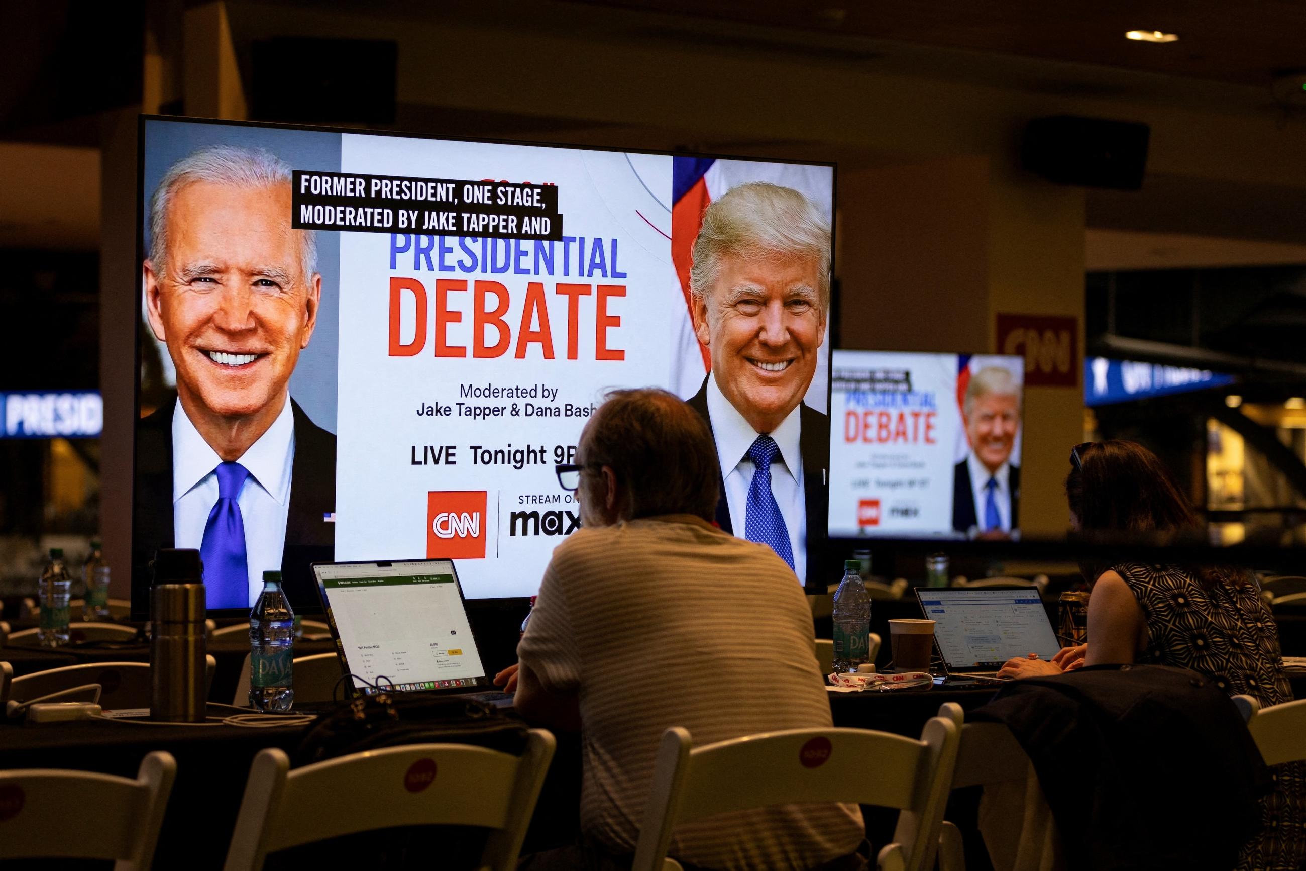 Media crews work at the press room in the McCamish Pavilion on the Georgia Institute of Technology campus ahead of the first 2024 presidential debate between U.S. President Joe Biden and former U.S. President Donald Trump in Atlanta, Georgia, June 27, 2024.
