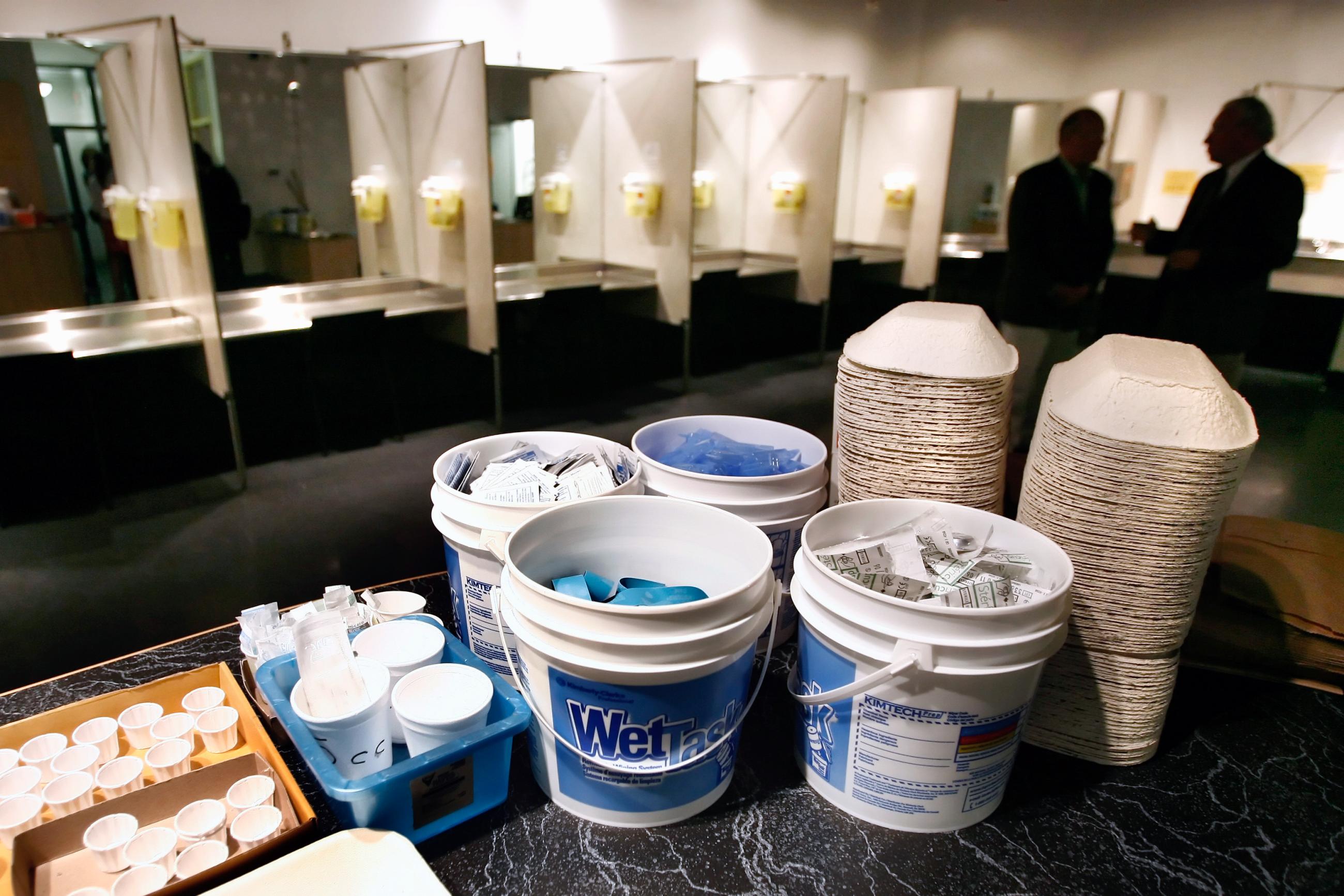 Supplies including syringes, bandaids and antiseptic pads waits to be used inside a safe injection site.