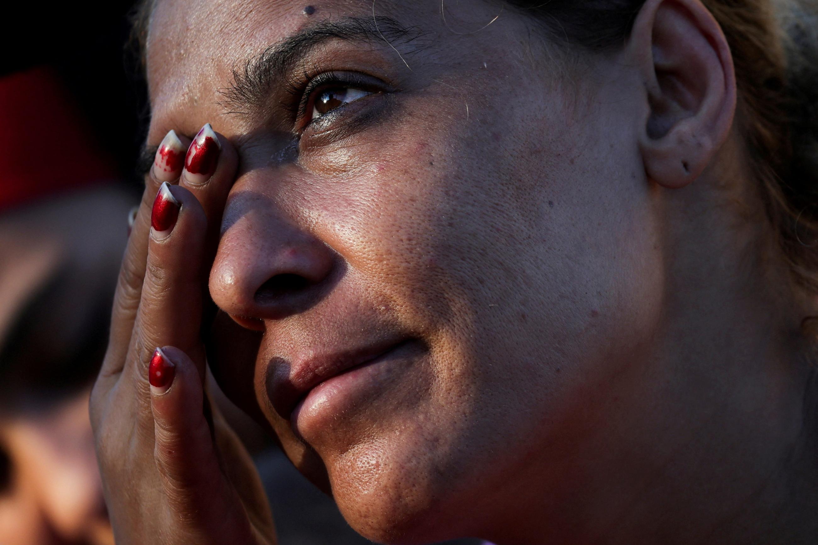 Amira, reacts during an interview at Beirut's central Martyrs' Square where many families fled from the Israeli strikes in southern Beirut.