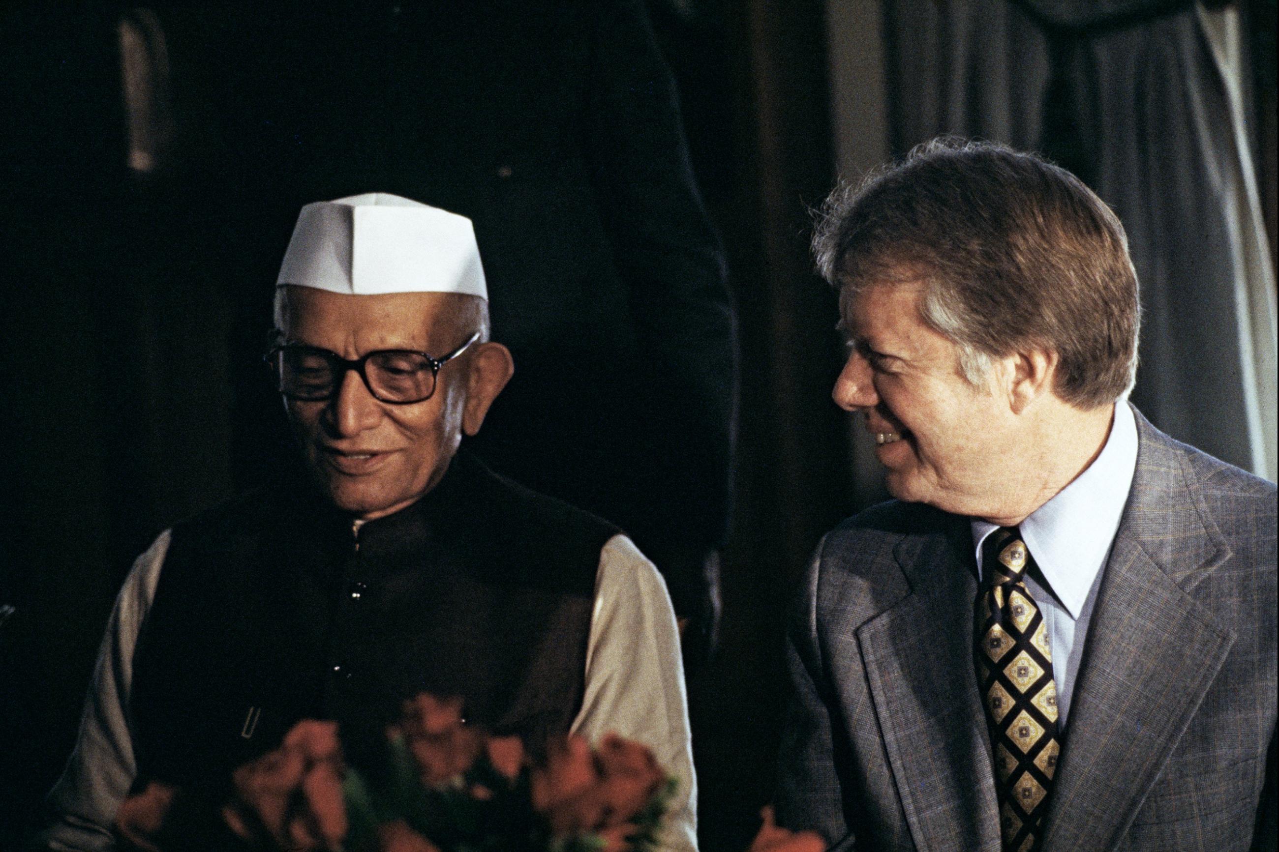 U.S. President Jimmy Carter (right) speaking with Indian Prime Minister Morarji Desai during a luncheon, in New Delhi, India, on January 2, 1978.
