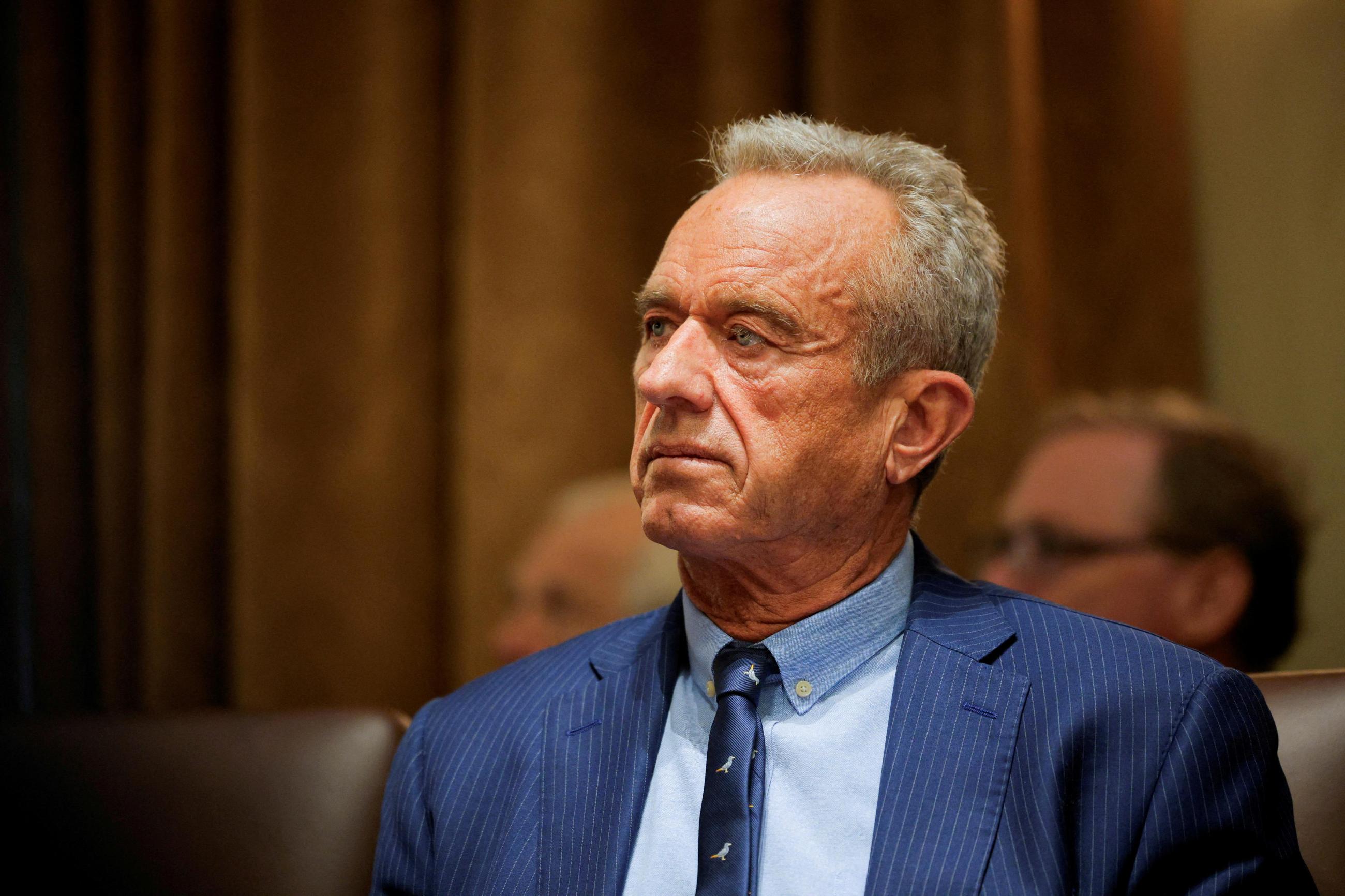 Secretary of Health and Human Services Robert F. Kennedy sits as U.S. President Donald Trump hosts his first cabinet meeting, in Washington, DC, on February 26, 2025. 