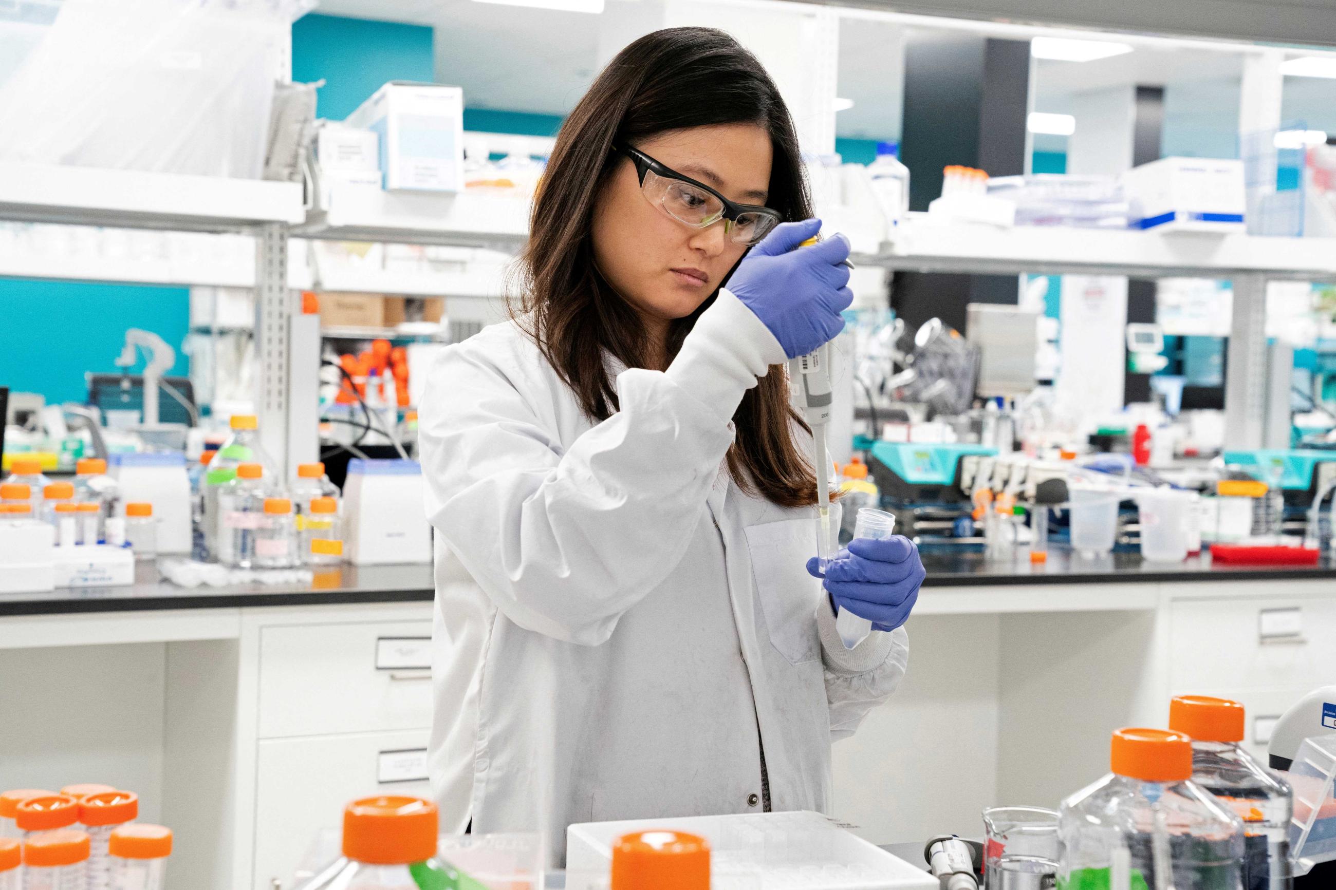Research assistant Marion Hong, of RNA medicines company Arcturus Therapeutics, conducts research on a vaccine for COVID-19, in San Diego, California, on March 17, 2020. 
