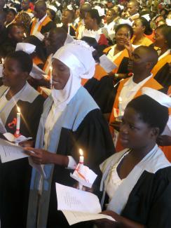 Malawi health care workers trained with PEPFAR funding attending a graduation ceremony in 2014. CDC image. 