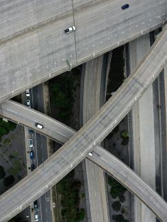 The image shows several highways from above, all almost empty. 