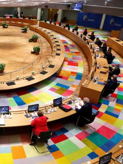 Where policy meets health: European Union leaders take part in the first face-to-face EU summit since the coronavirus disease (COVID-19) outbreak began, in Brussels, Belgium, on July 17, 2020. The photo shows a large round table from above with various leaders seated far apart from one another. 