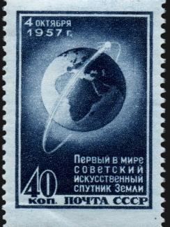  The photo shows a Russian stamp commemorating Sputnik. 