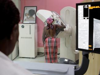 A patient undergoes a mammogram X-ray picture of the breast to look for early signs of breast cancer in the radiology unit at the Kenyatta National Hospital in Nairobi, Kenya on January 23, 2020. 