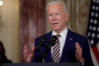 U.S. President Joe Biden delivers a foreign policy address as Vice President Kamala Harris listens, at the State Department in Washington, DC on February 4, 2021.