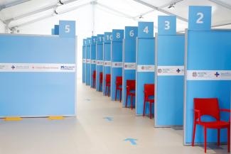 Interior view of a tent during preparations to turn the long-term car park at Fiumicino airport into a coronavirus disease (COVID-19) vaccination centre, in Rome, Italy, February 5, 2021. 
