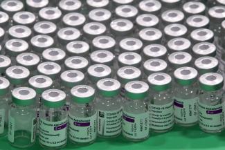Empty vials of Oxford/AstraZeneca's COVID-19 vaccine are seen at a vaccination centre in Antwerp, Belgium March 18, 2021.