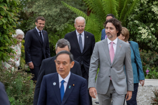 Japan's Prime Minister Yoshihide Suga, Italy's Prime Minister Mario Draghi, Canada's Prime Minister Justin Trudeau, U.S. President Joe Biden, German Chancellor Angela Merkel, France's President Emmanuel Macron, and Britain's Queen Elizabeth at the G7 summit in Cornwall, Britain on June 11, 2021. Jack Hill/Pool via REUTERS