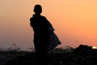 Ayoub Mohammed Ruzaiq, 11, stands in a garbage dump—where his family collected food to eat—near the Red Sea port city of Hodeidah, Yemen on January 13, 2018.