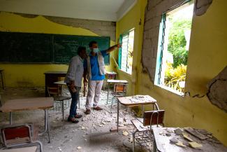 UNICEF's Bruno Maes and Haiti Minister of Education Marie Lucie Joseph tour damaged schools after a 7.2-magnitude earthquake hit the country on August 14, 2021. Photo taken August 17, 2021.