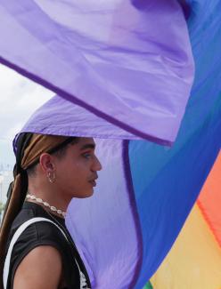 A marcher protests the draft of a new penal code that will allow discrimination against people based on their sexual orientation, in Santo Domingo, Dominican Republic, on July 11, 2021.