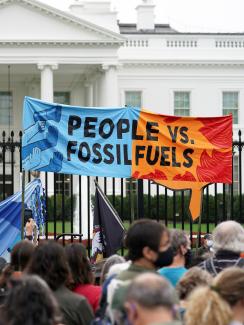 People demonstrate during a climate change protest on Indigenous People's Day, outside the White House, in Washington, DC, on October 11, 2021.