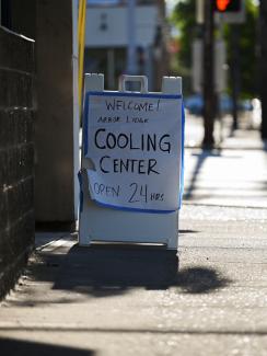 A sign sits outside of a cooling shelter during a heat wave in Portland, Oregon, U.S., August 11, 2021.