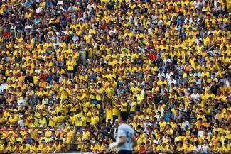 Soccer fans attend a match between Viettel and Duoc Nam Ha Nam Dinh of Vietnam's national soccer league after an outbreak and nationwide COVID-19 lockdown, in Nam Dinh province, Vietnam, on June 5, 2020.