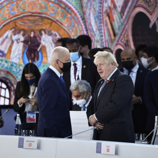 U.S. President Joe Biden and Britain's Prime Minister Boris Johnson at the opening session of the G20 Summit in Rome, Italy, October 30, 2021. 