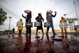 Ocean Rebellion activists protest against destructive industrial fishing during the UN Climate Change Conference (COP26), in Glasgow, Scotland, United Kingdom, on November 4, 2021. 