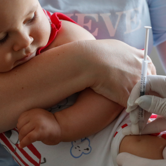 A baby receives a vaccine injection at a children's clinic in Kiev, Ukraine, on August 14, 2019. 