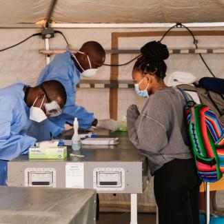 Passengers register their information on arrival at Sir Seretse Khama International Airport in Gaborone, Botswana, June 3, 2020