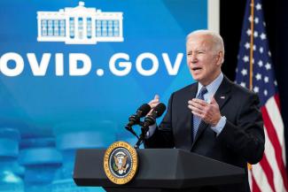 U.S. President Joe Biden delivers remarks on the coronavirus disease (COVID-19) before receiving a second COVID-19 booster vaccination in the Eisenhower Executive Office Building’s South Court Auditorium at the White House in Washington, U.S., March 30, 2022.