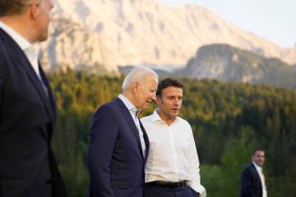 DOCUMENT DATE:  June 26, 2022  French President Emmanuel Macron, center right, speaks with U.S. President Joe Biden after a group photo at the G7 summit at Castle Elmau in Kruen
