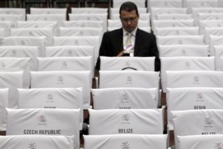 Names of countries taking part to the 8th World Trade Organization Ministerial Conference are pictured taped onto rows of chairs for delegates, in Geneva, Switzerland, on December 15, 2011.