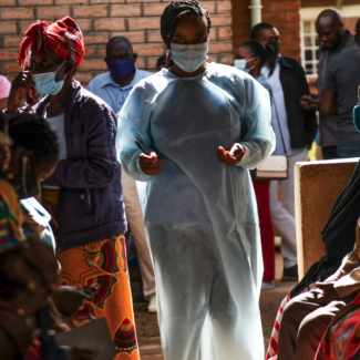 A health worker prepares to administer COVID-19 vaccines at Ndirande Health Centre in Blantyre, Malawi.