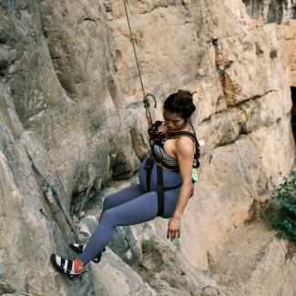 Min Min rock climbing while pregnant in her third trimester in 2022, Yangshuo, China.