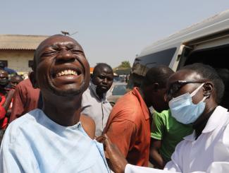 A man receives a dose of COVID-19 vaccine, during a mass vaccination exercise at Wuse market in Abuja, Nigeria, on January 26, 2022.