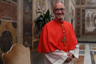 Cardinal Michael Czerny poses as he meets with relatives and friends during a courtesy visit following his appointment by the Pope, on October 5, 2019, in the Vatican.