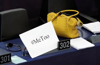 A "MeToo" placard is seen on a European Parliament member's desk during a debate to discuss preventive measures against sexual harassment and abuse at the European Parliament in Strasbourg, France.