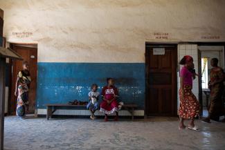 Women and their children wait for a consultation in the waiting area of the Yakusu General Hospital, Tshopo, Democratic Republic of Congo, October 5, 2022.