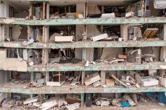 An aerial view shows a damaged building in Antakya's historical city center, the worst hit in an earthquake which killed more than 50,000 people in Turkey and leaving millions homeless, in Hatay province, Turkey May 5, 2023.