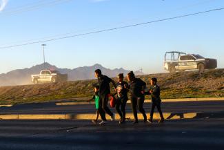 Migrants from Venezuela try to evade an operation carried out by police and agents of the National Institute of Migration (INM) of Mexico on the banks of the Rio Bravo River, the border between the U.S. and Mexico, in Ciudad Juarez, Mexico, October 6, 2023. 