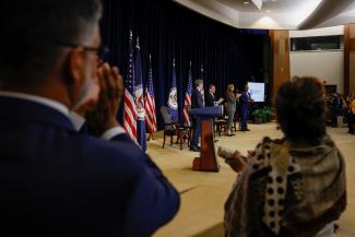 Attendees applaud at the launch of the Bureau of Global Health Security and Diplomacy at the State Department.