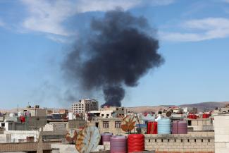Smoke rises from Syria's Kurdish-controlled northeast city of Qamishli.