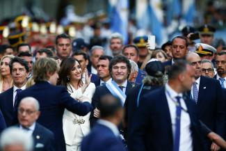 Argentina's President Javier Milei and Vice President Victoria Villarruel walk to the Metropolitan Cathedral.