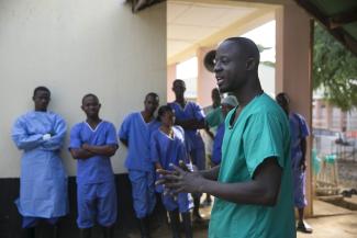 Doctor Sekou Kanneh speaks during an interview.