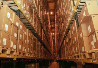 Boxes of the antiviral drug Tamiflu are stacked in a warehouse in Britain April 29, 2009. 